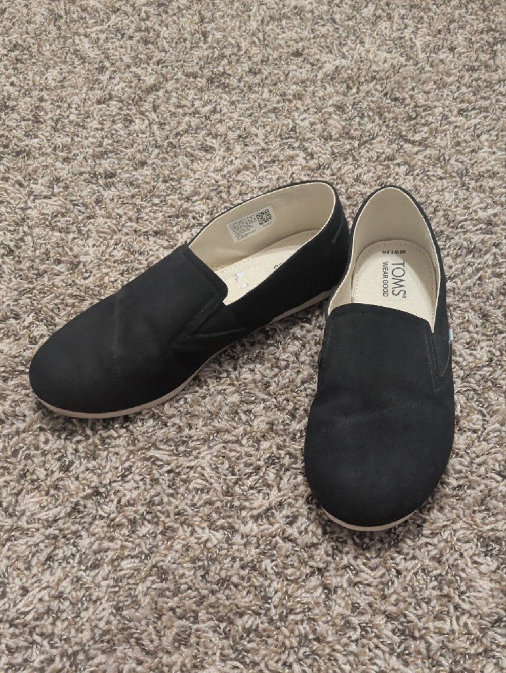 TOMS classic black slip on moccasins